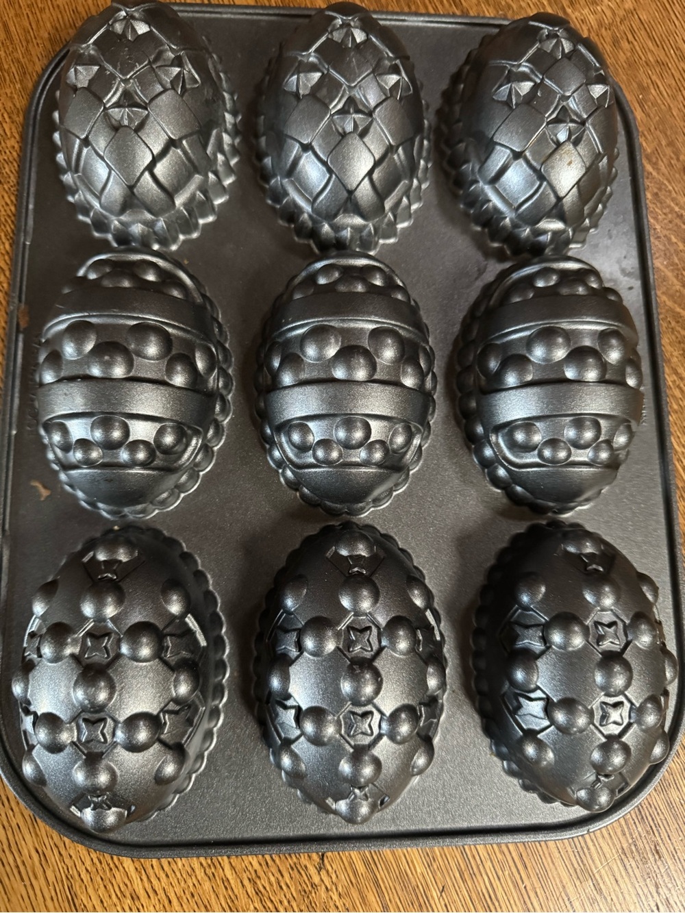 Nordic Ware Nonstick Egg-Shaped Mini Cake Pan in Metallic Black